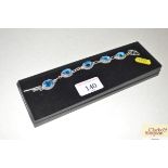 A 925 mark blue topaz set bracelet