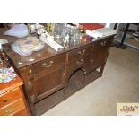 An antique design oak dresser base fitted drawers,