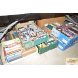 A quantity of various books, cassettes, videos etc