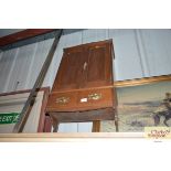 A 20th Century wall mounted cabinet