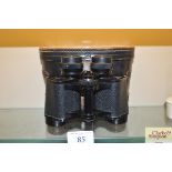 A pair of Gothard 8x30 binoculars in fitted leathe