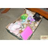 A box containing various children's toys; a Beatri