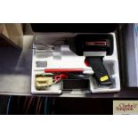 A Weller soldering iron in fitted case