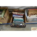 A box of various military and aircraft books