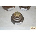 Six brass and cast iron graduated shop weights ½oz