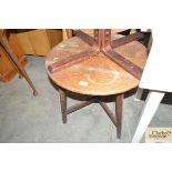 An oak circular topped table