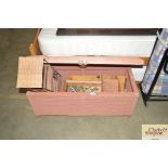 A Loom upholstered ottoman; an orange tool chest a