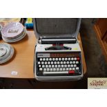 A Brother Deluxe 1350 typewriter in carrying case