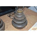 Eight cast iron and brass graduated shop weights,