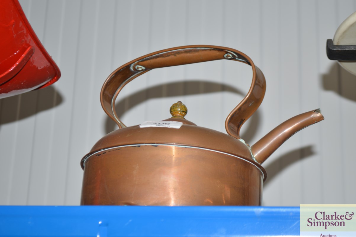 An antique copper kettle