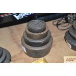 Four cast iron graduated shop weights, 8oz - 4lb