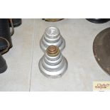 Seven brass and cast iron graduated weights, ½oz-2