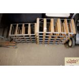 Two wooden and metal wine racks