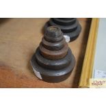 Six cast iron graduated shop weights, 1oz - 2lb