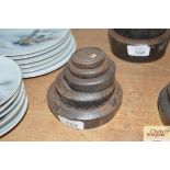 Five cast iron graduated shop weights, ¼lb - 4lb