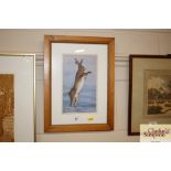 A pine framed watercolour depicting a hare