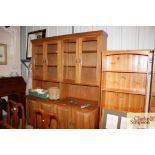 A large hardwood dresser raised on cupboard base