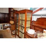 An Edwardian glazed china display cabinet