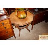 An octagonal topped window table