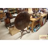 A 19th Century mahogany tripod tilt top table