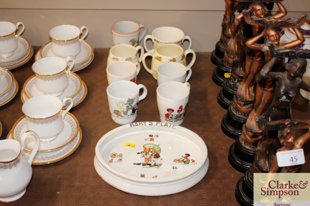 A 1930's baby's plate; and eight children's mugs