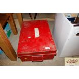 A red painted metal box