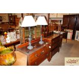 An oak dressing chest fitted two long drawers