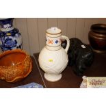 A Victorian white glazed ewer with dragon decoration