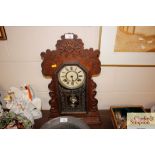 An American two hole oak cased clock