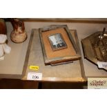 Three silver photo frames