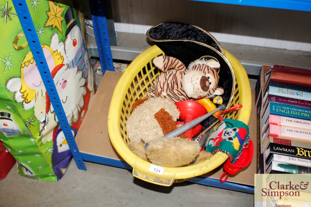 A plastic basket of various children's toys