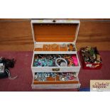 A jewellery box and contents of various costume je