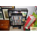 Two CD storage units and contents