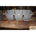 Three connected galvanised planters (137)