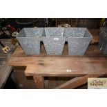 Three connected galvanised planters (136)