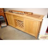 A light oak sideboard fitted single drawer with in