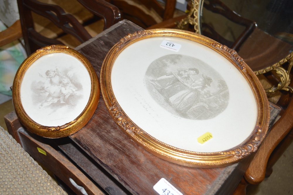 Two oval gilt framed classical prints