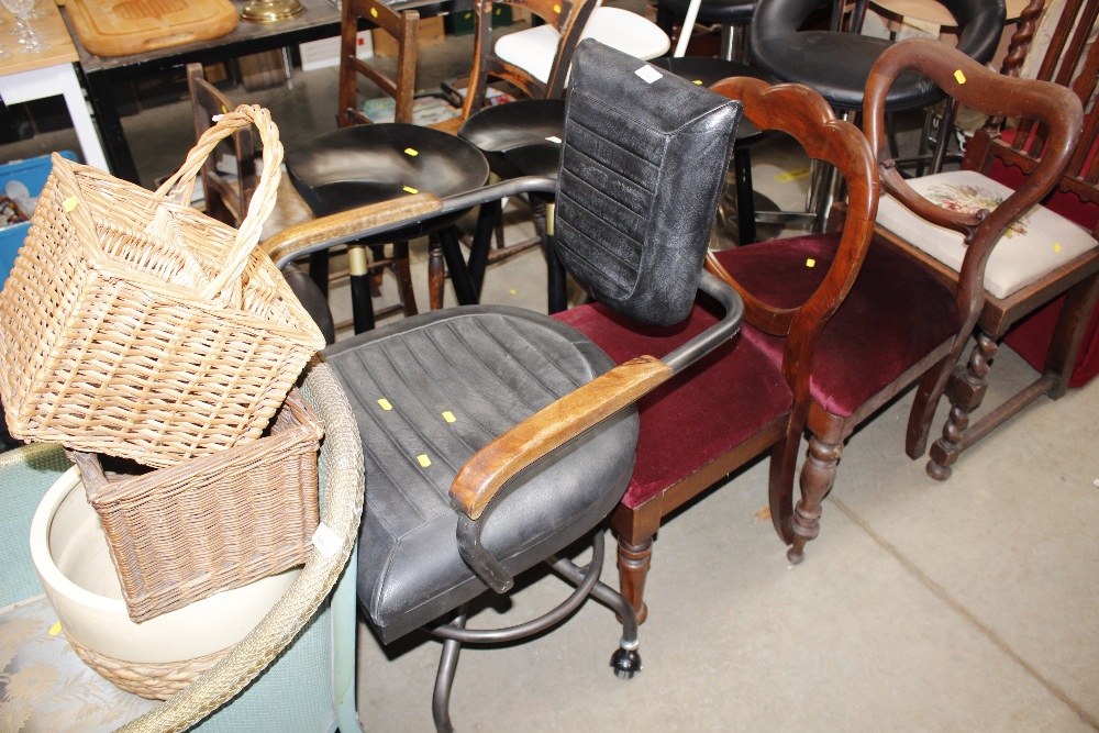 A Venus classic swivel black upholstered chair