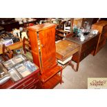 A yew wood CD cabinet and contents; and a yew wood