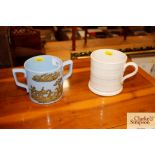 A Victorian two handled mug; and a creamware mug