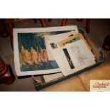 A box of miscellaneous unframed prints