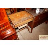 A Victorian walnut work table AF