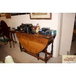 A antique oak gate leg dining table