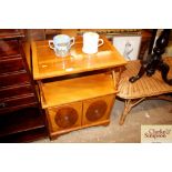 A yew wood finish two tier side cabinet