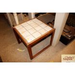 A teak tile top occasional table