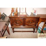 A Jacobean style oak dresser base