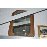 An oak framed bevel edge wall mirror