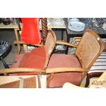 A pair of cane back 1920's/30's armchairs