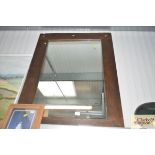 A large oblong wall mirror
