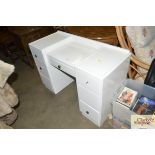 A white painted knee hole dressing table